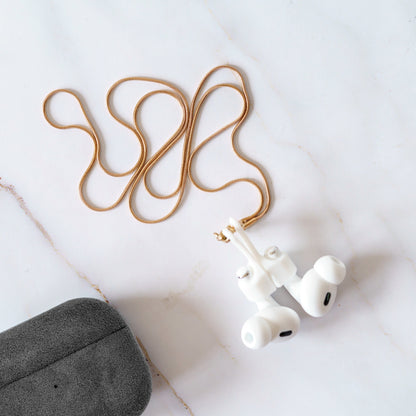 AirPods Alcantara case with necklace in lifestyle use